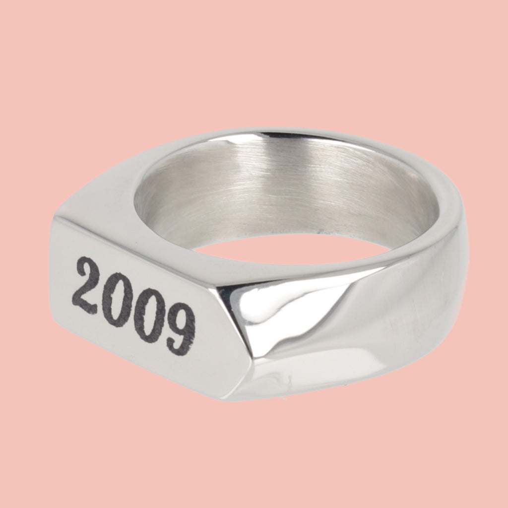 Chunky stainless steel ring with birth year engraved in black