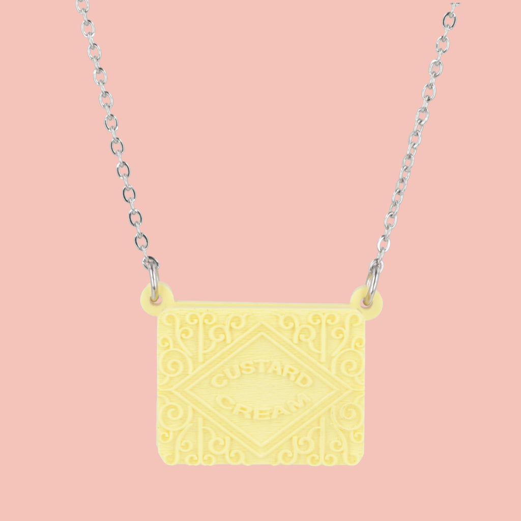 Custard cream necklace on a pink background