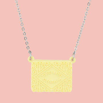 Custard cream necklace on a pink background