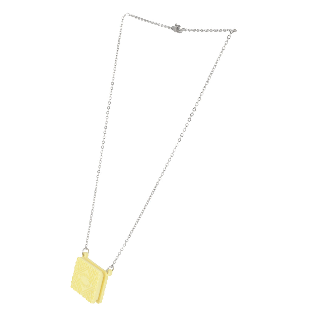 Custard cream necklace on white background