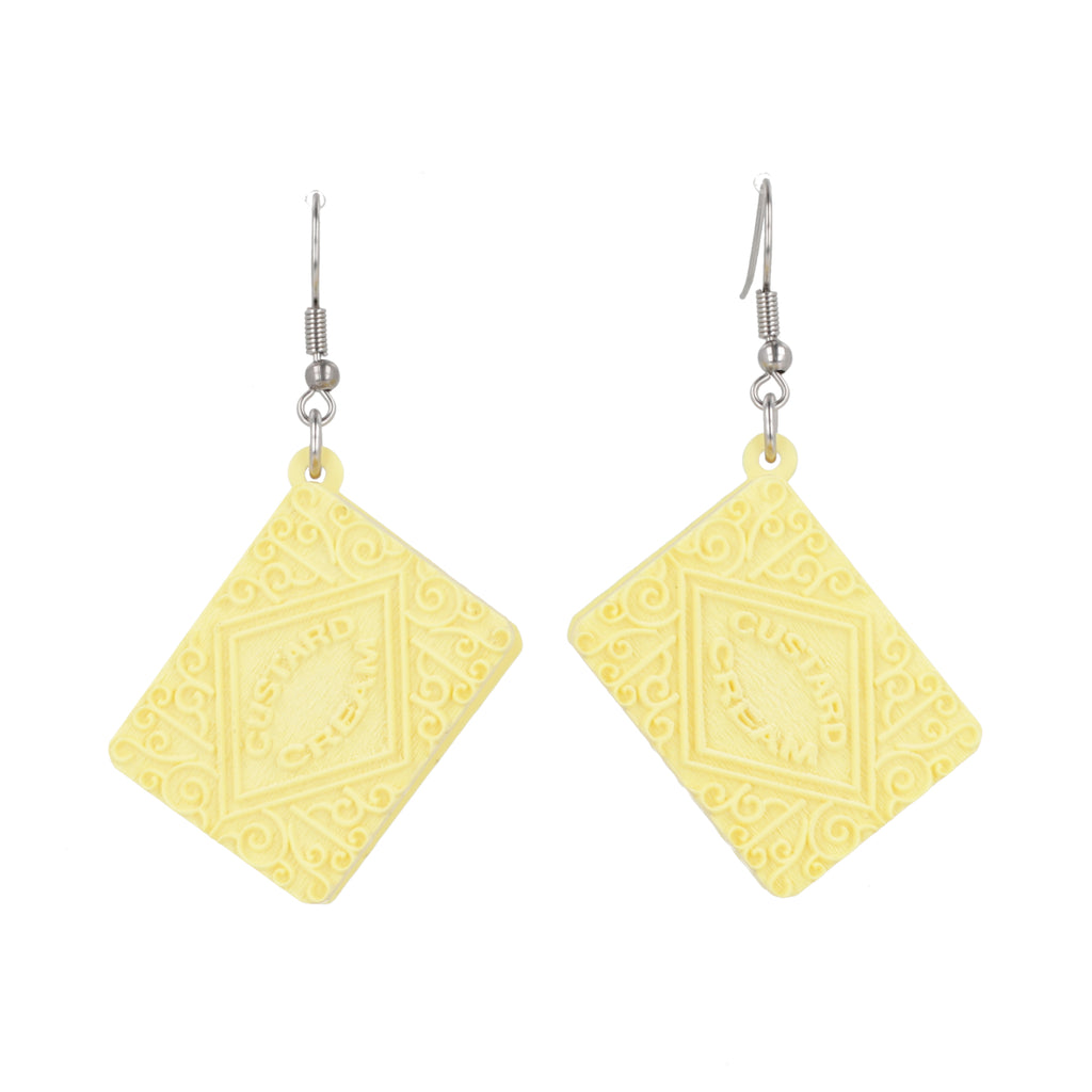 Custard cream earrings on a white background