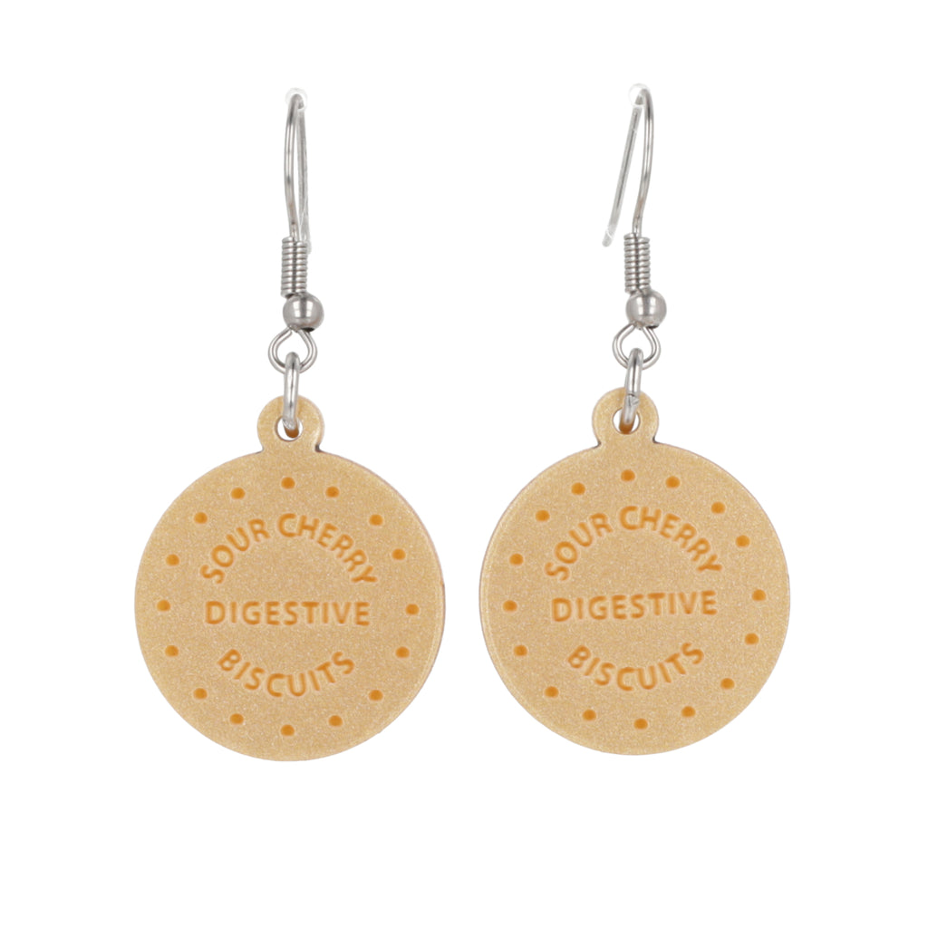 Digestive biscuit earrings on a white background