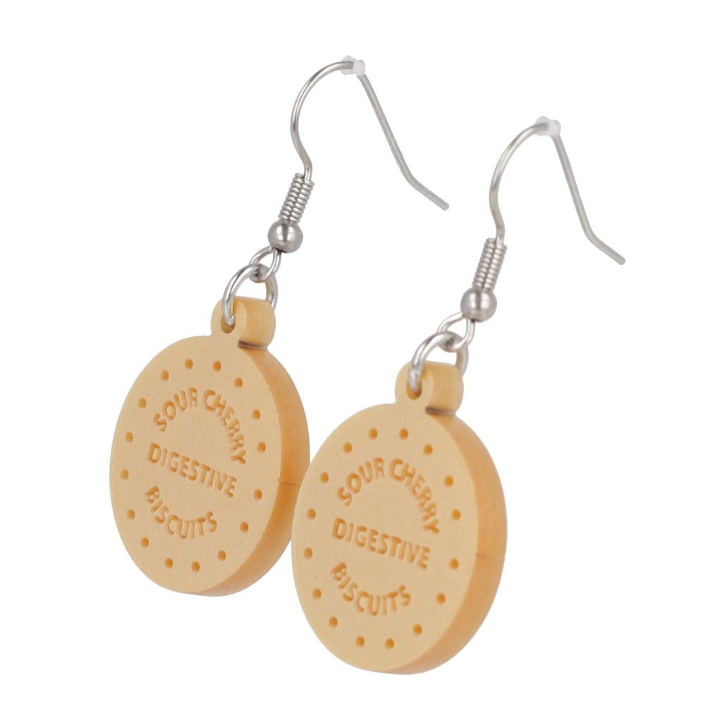 Digestive biscuit earrings on a white background