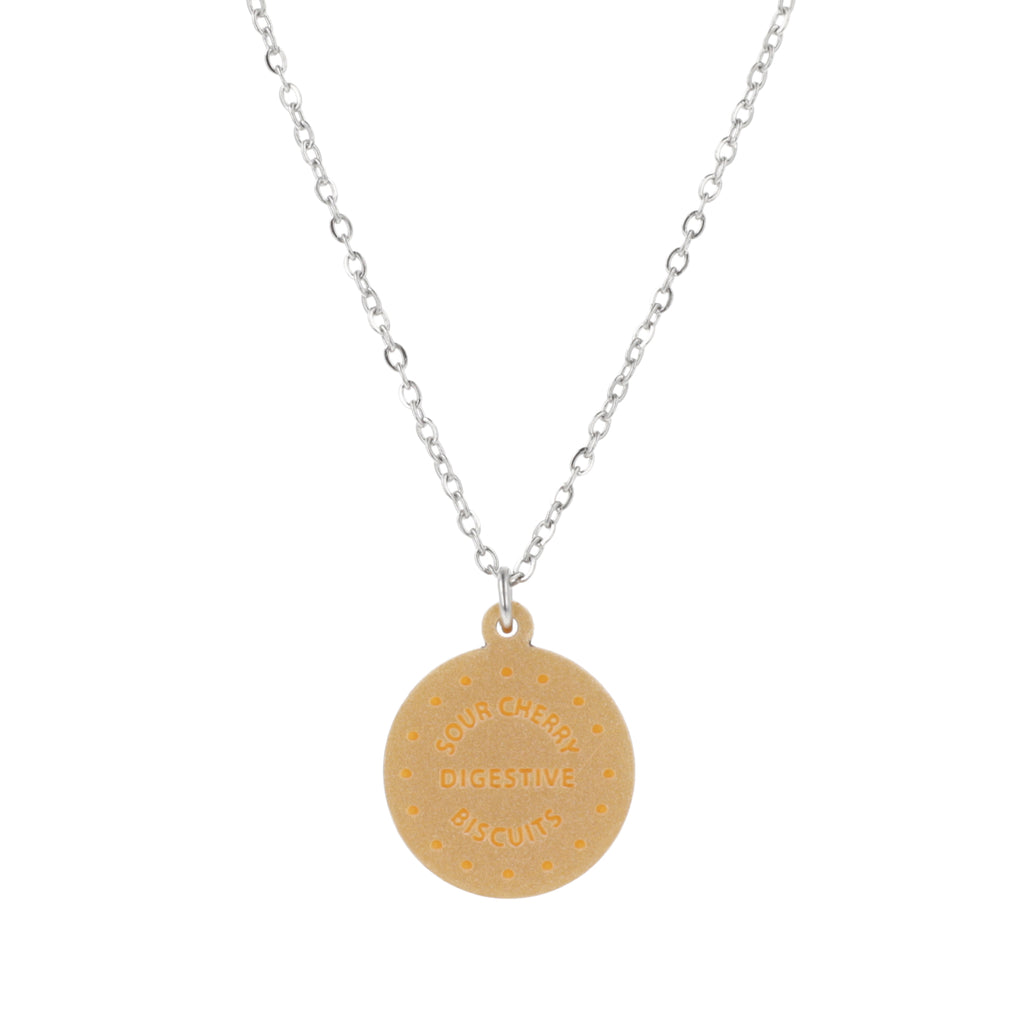 Necklace with a digestive biscuit pendant on a white background