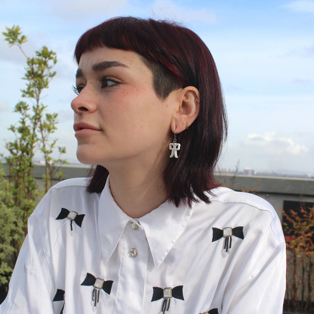 Mini White Bow Huggie Hoop Earrings - Sour Cherry