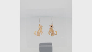 Dog charms with an extra layer of holographic glitter to replicate a ghost n stainless steel earwires