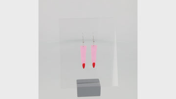 Pink witch's finger charm on stainless steel earwires