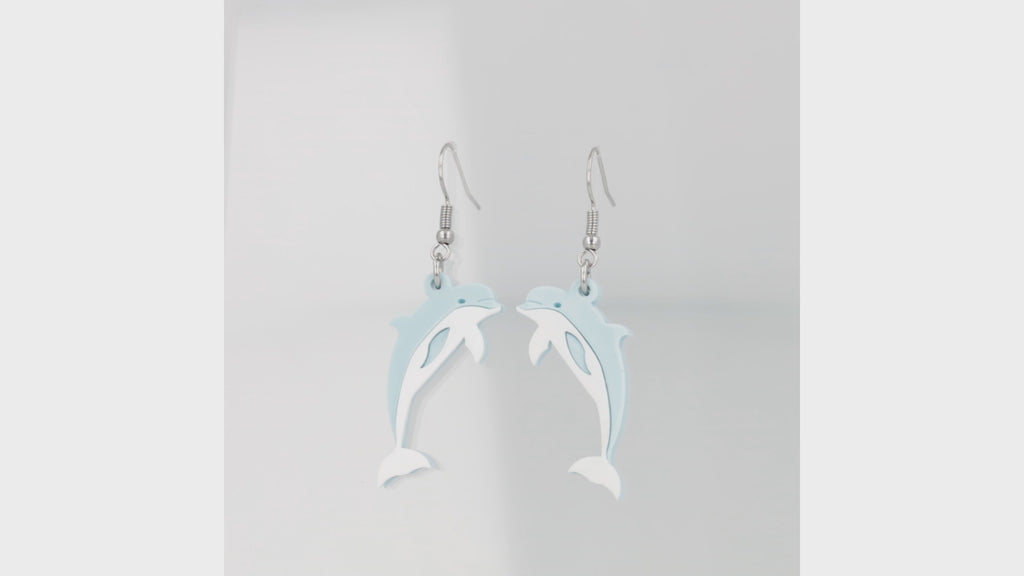 360 view of Light blue acrylic Dolphin charms on stainless steel earwires
