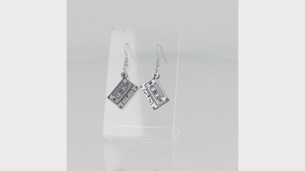 360 view of grey acrylic mix tape style charms on stainless steel earwires