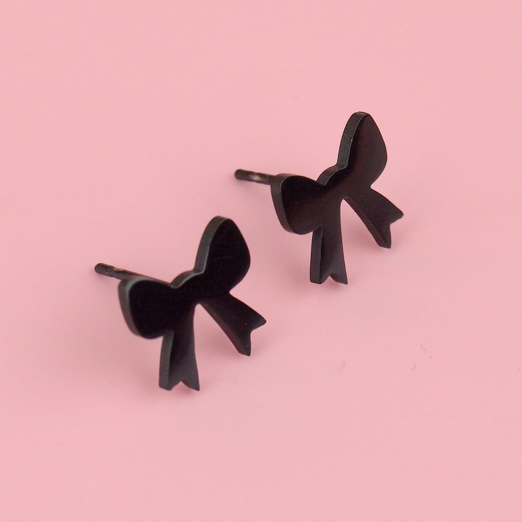Black bow shaped studs stainless steel studs