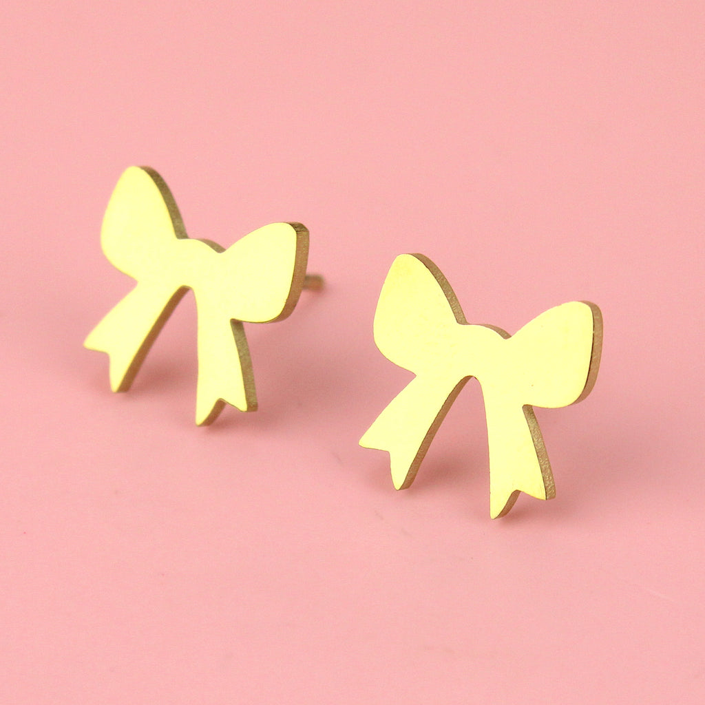 Gold plated stainless steel bow shaped studs