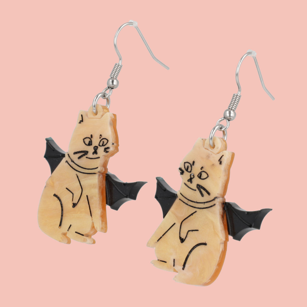 Ginger cat charm with bat wings on stainless steel earwires