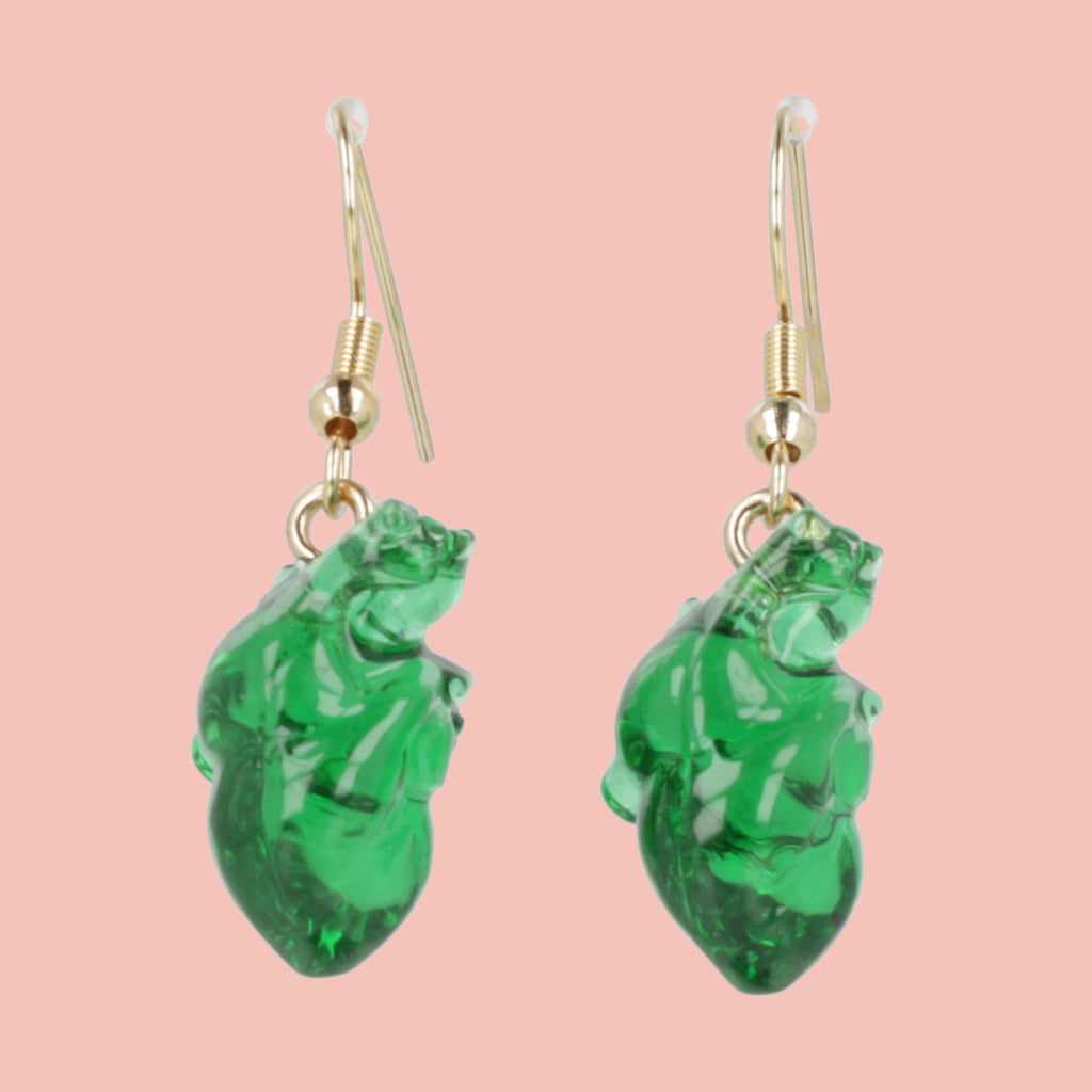 Green human heart charms on gold plated stainless steel earwires