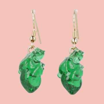 Green human heart charms on gold plated stainless steel earwires