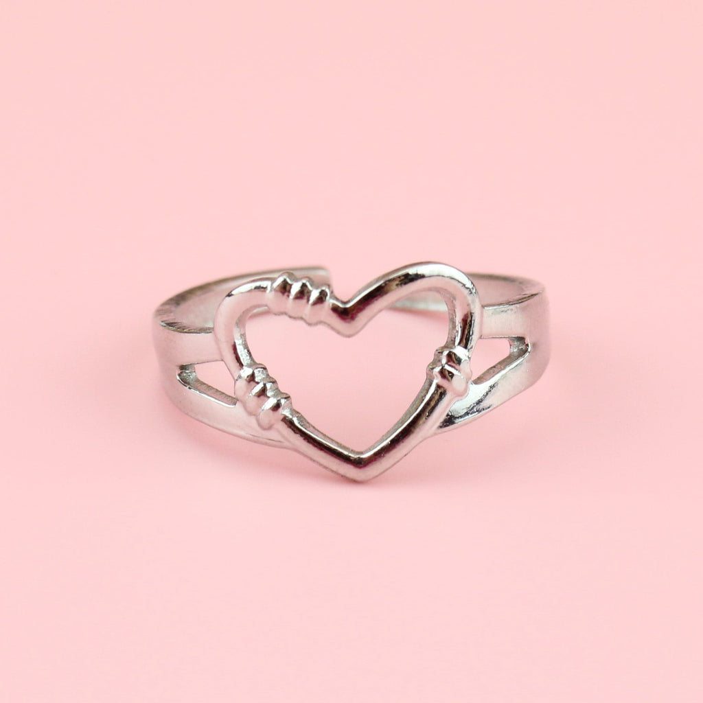 Stainless steel ring with a barbed wire heart design 
