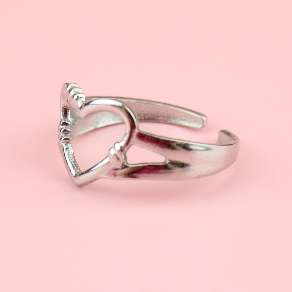 Stainless steel ring with a barbed wire heart design 