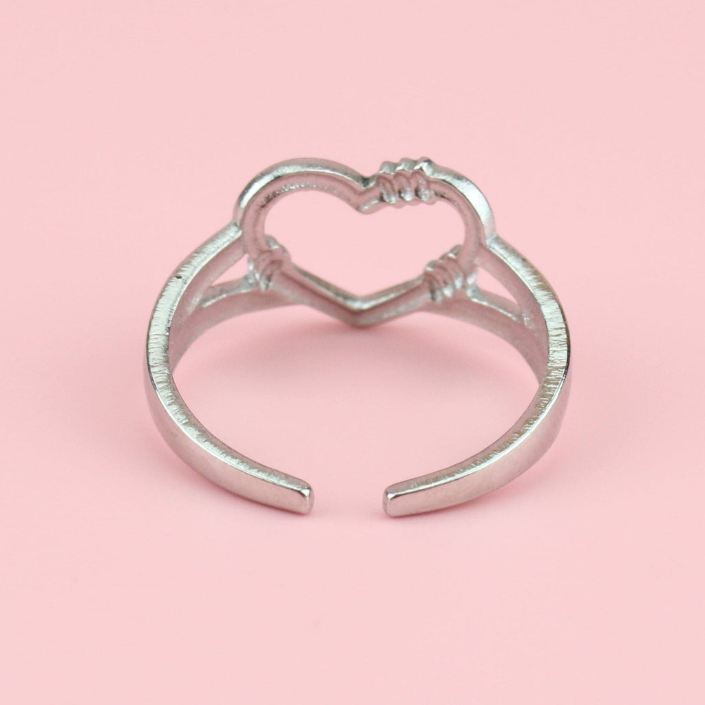 Stainless steel ring with a barbed wire heart design 