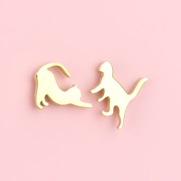 Gold Plated Stainless Steel studs that show two cats stretching