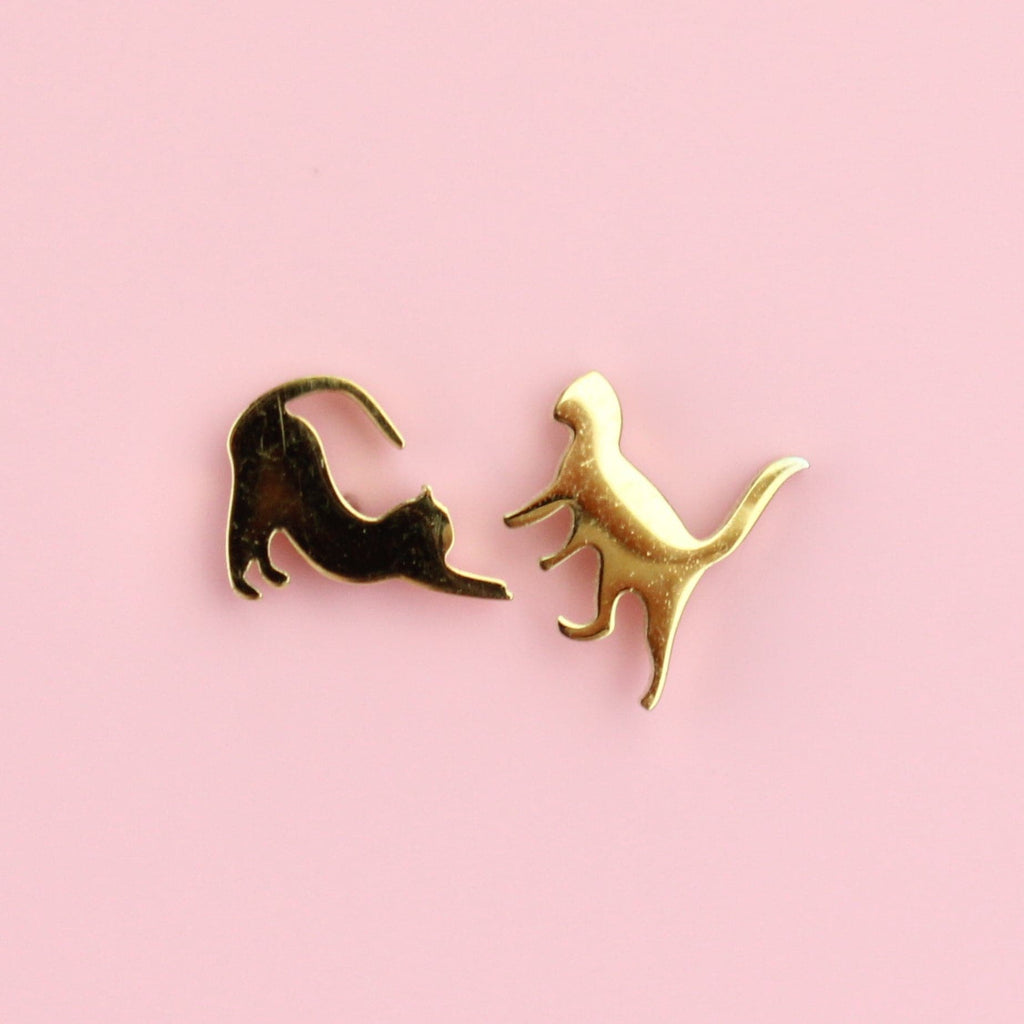 Gold Plated Stainless Steel studs that show two cats stretching