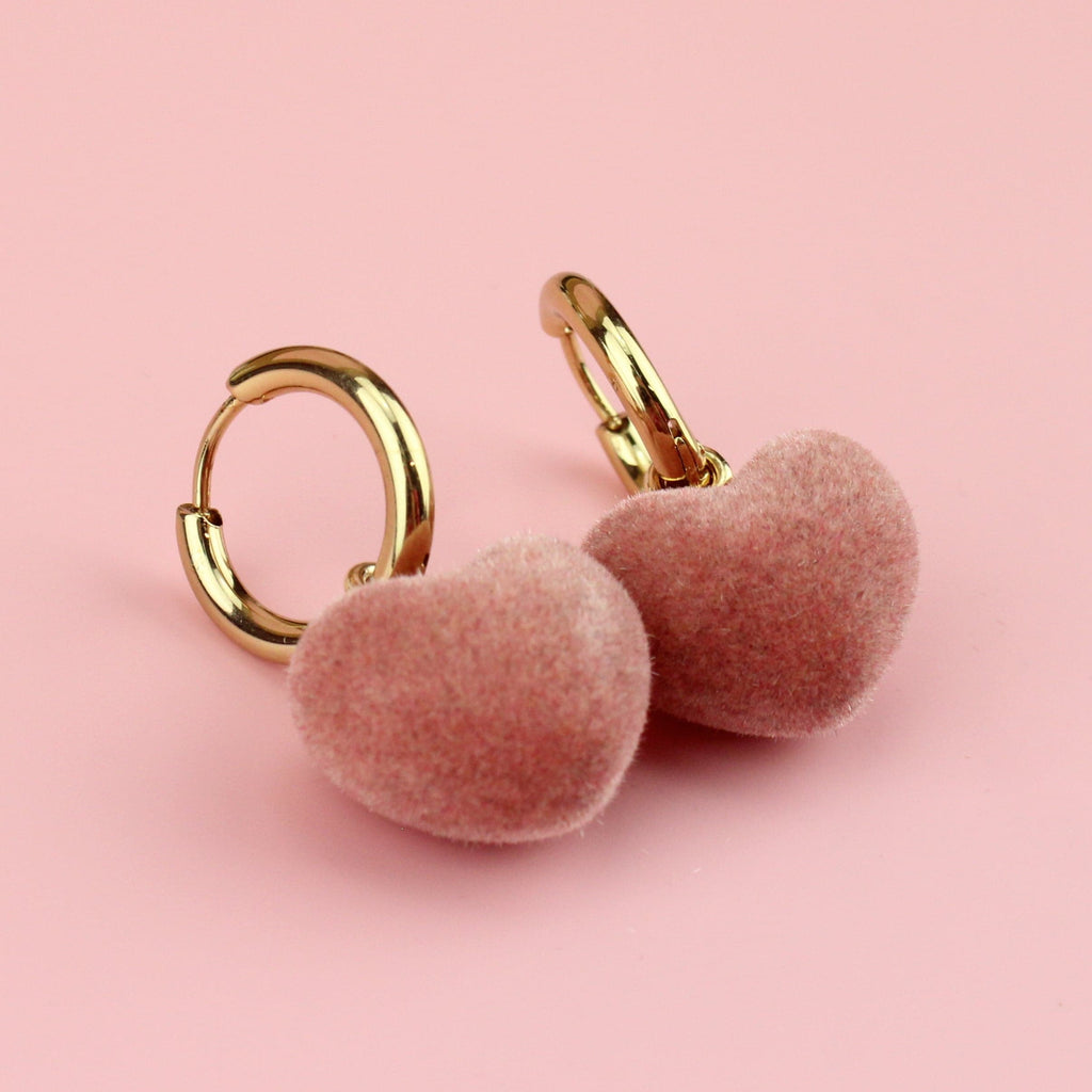 Flock pink heart charms on gold plated stainless steel hoops