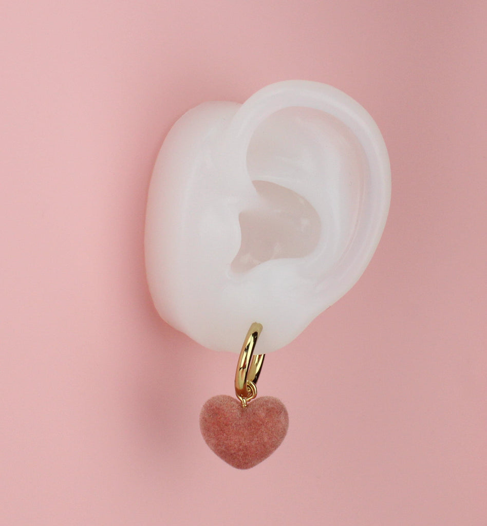 Ear showing the Blush Pink Sweetheart Hoop Earrings
