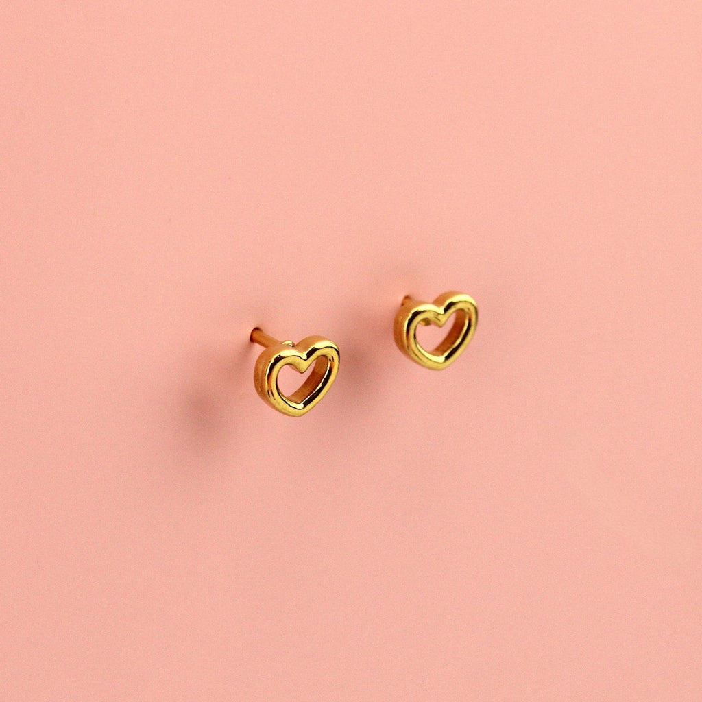 Small gold plated stainless steel cut out heart studs