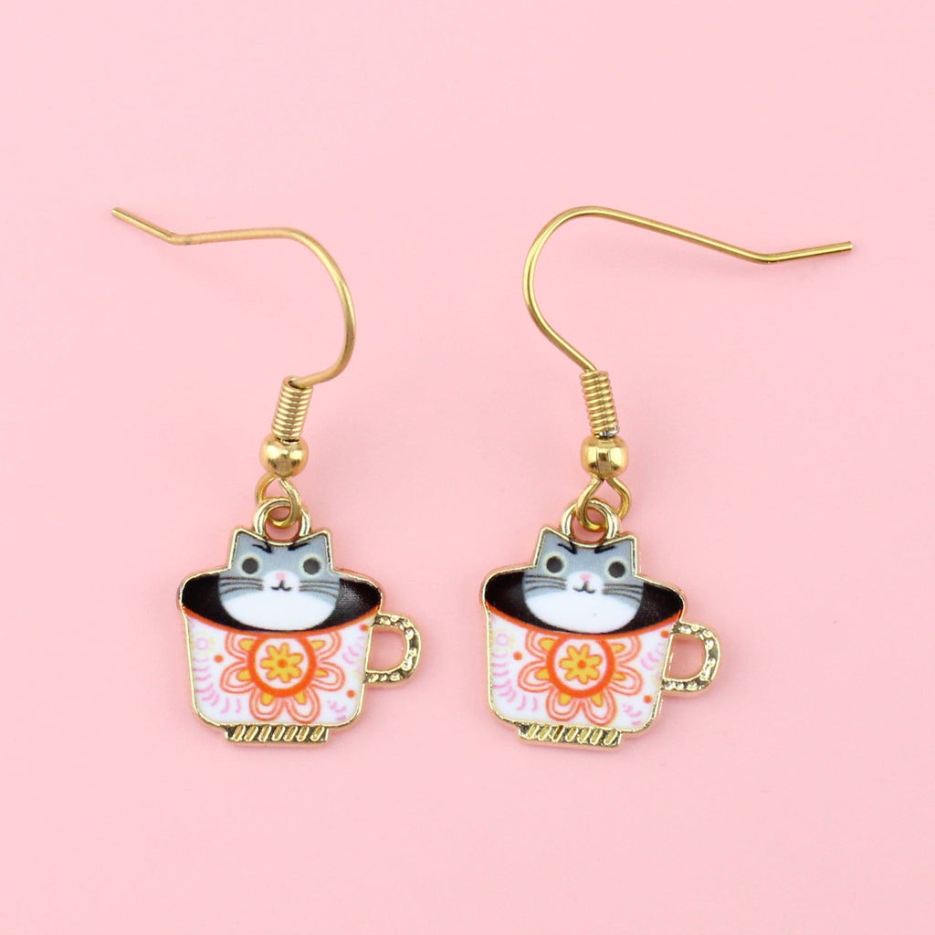 Gold plated stainless steel earwires with charms featuring cats in a teacup