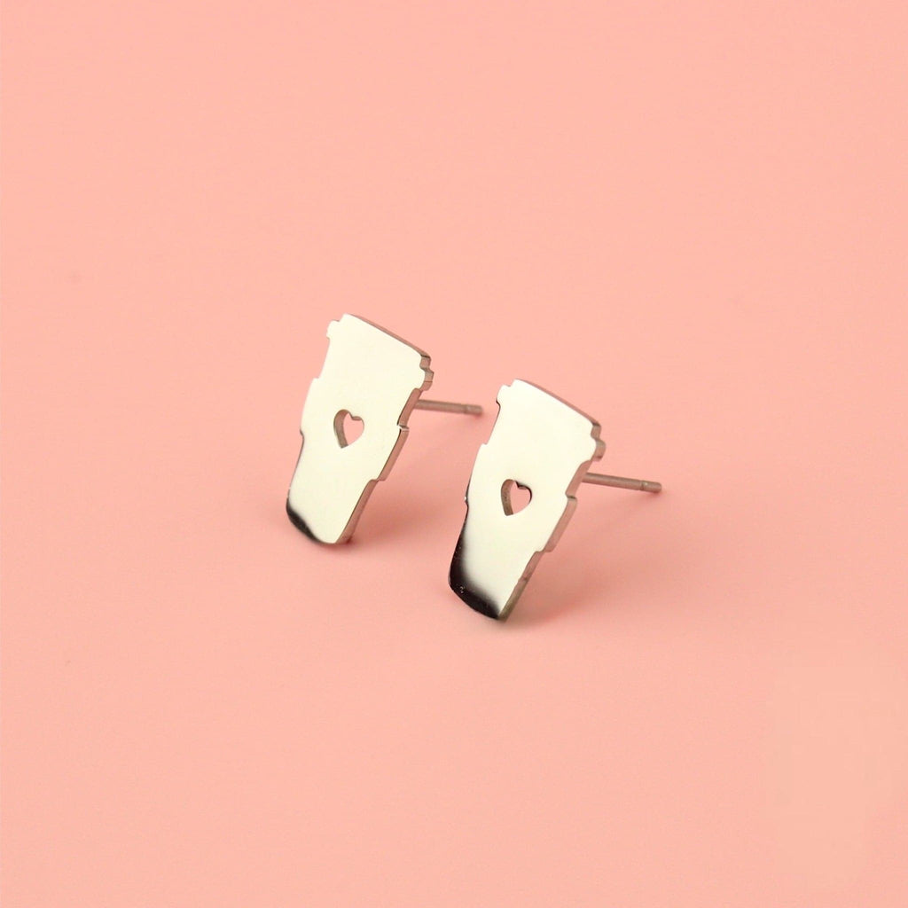 Coffee cup shaped stainless steel studs with a cut out heart in the middle