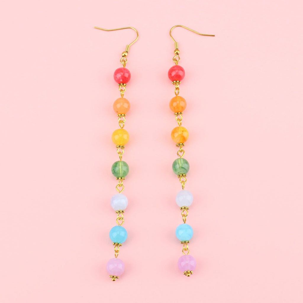 Rainbow coloured beads on gold plated charms with gold plated stainless steel earwires
