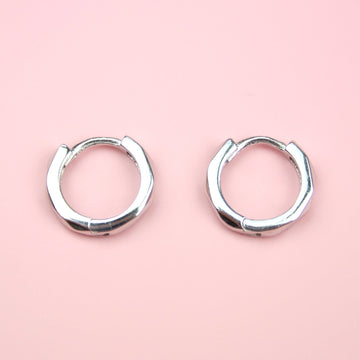 Sterling Silver Hoop Huggies with a Diamond cut edge