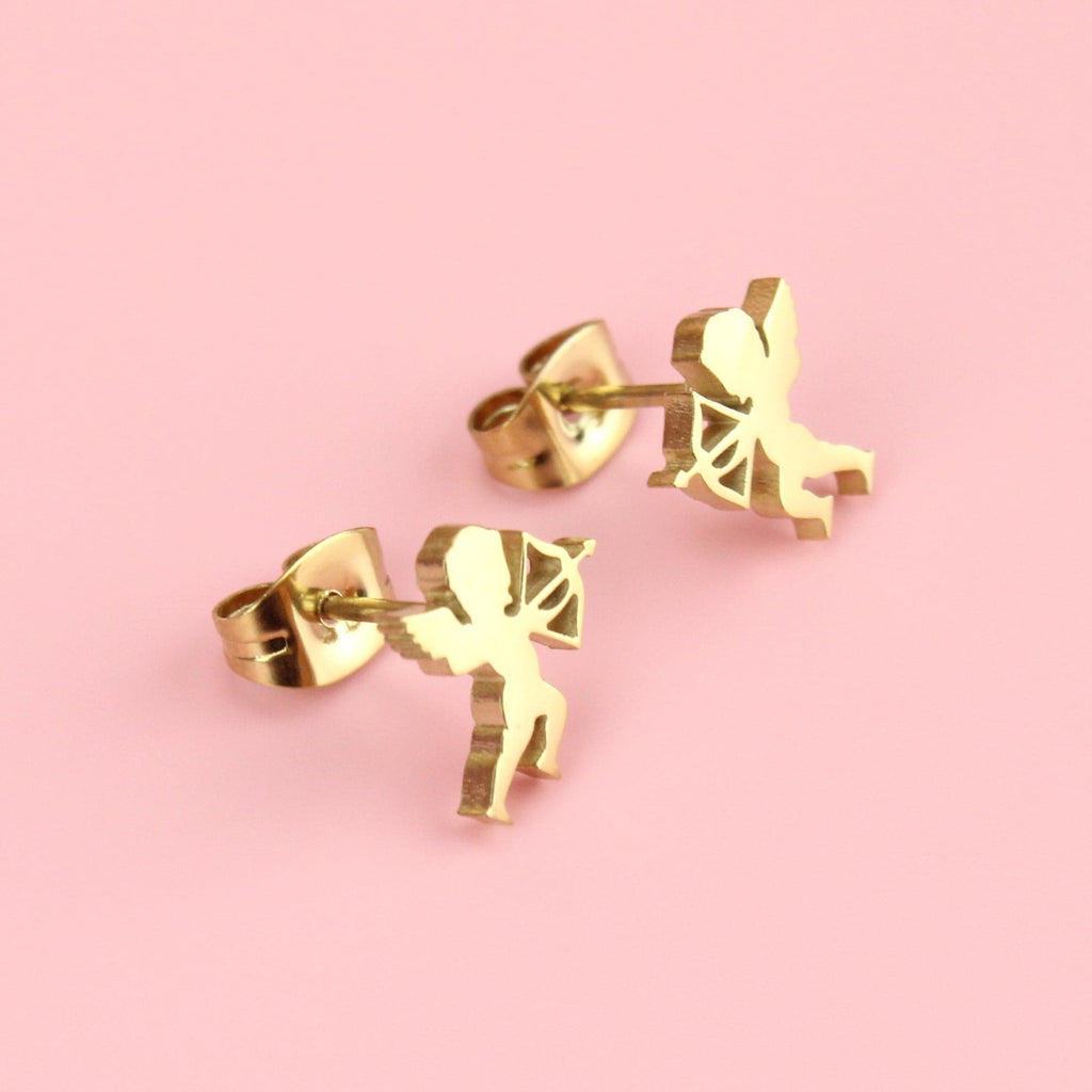 Gold plated stainless steel studs in the shape of a cherub with a bow and arrow