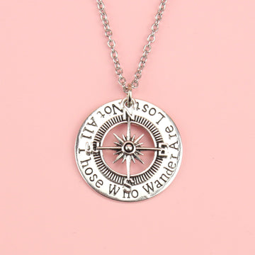 Silver Plated Compass Charm stamped with “Not all those who wander are lost” on a 18” Stainless Steel Chain 