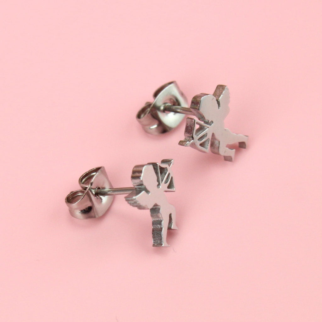 Stainless steel studs in the shape of a cherub with a bow and arrow