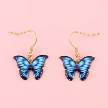 Bright blue butterfly charms on gold plated stainless steel earwires 