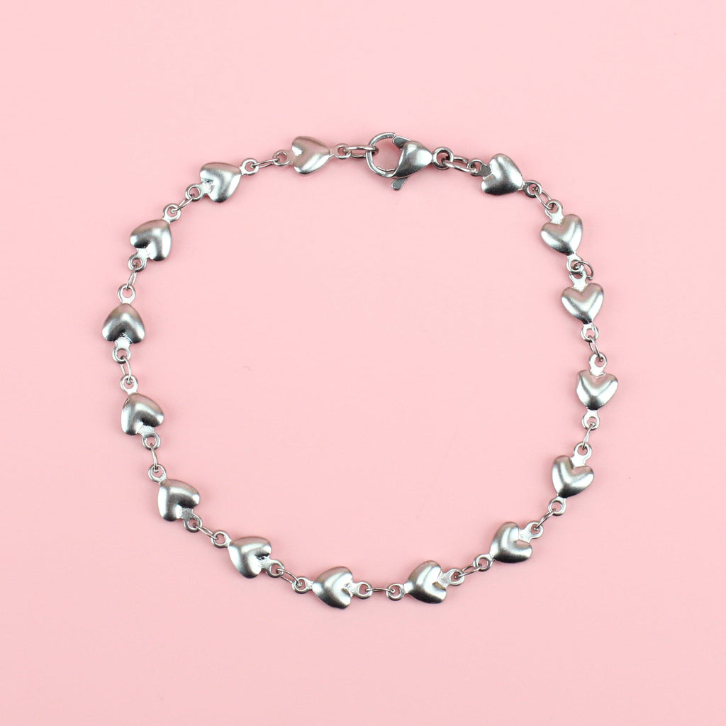 Heart charms on a stainless steel bracelet
