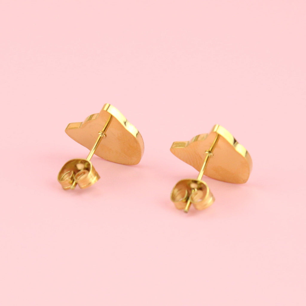 Gold plated stainless steel leopard face stud earrings with emerald eyes