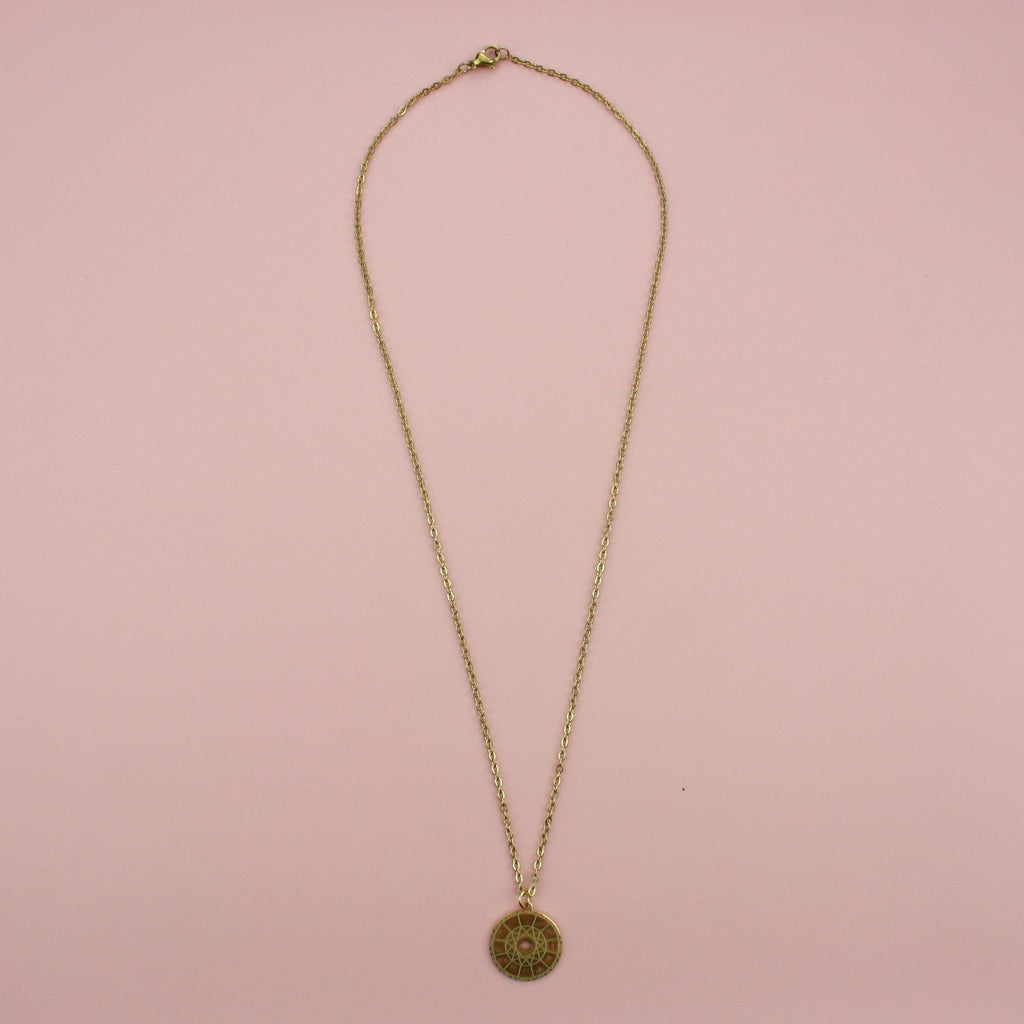 Gold plated stainless steel necklace with an astrology wheel pendant