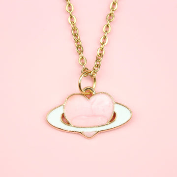 Gold plated & enamel pink heart planet charm on a Gold Plated Stainless Steel chain