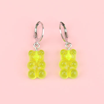 Green gummy bear charms on huggie hoops