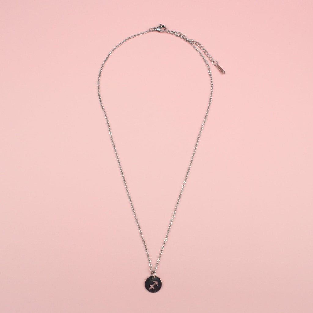 Stainless Steel necklace with a cut out charm of the Sagittarius symbol