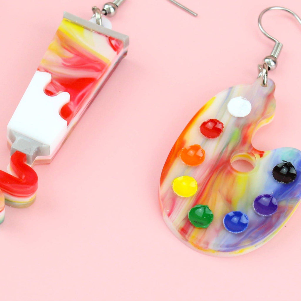 3 pack of earrings - Paint brush earring, Paint tube earring showing paint coming out of the tube, and an art pallette earring (all on stainless steel earwires)