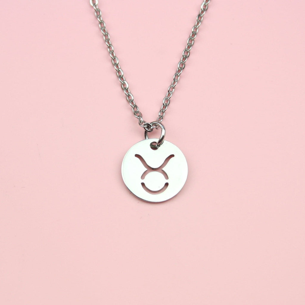 Circular taurus symbol pendant on a stainless steel chain