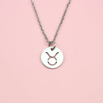 Circular taurus symbol pendant on a stainless steel chain