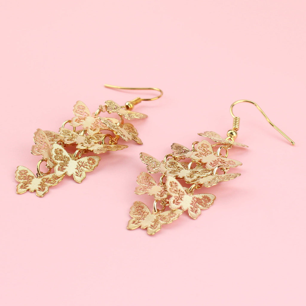 A Cluster of Butterly Charms on Gold Plated wires