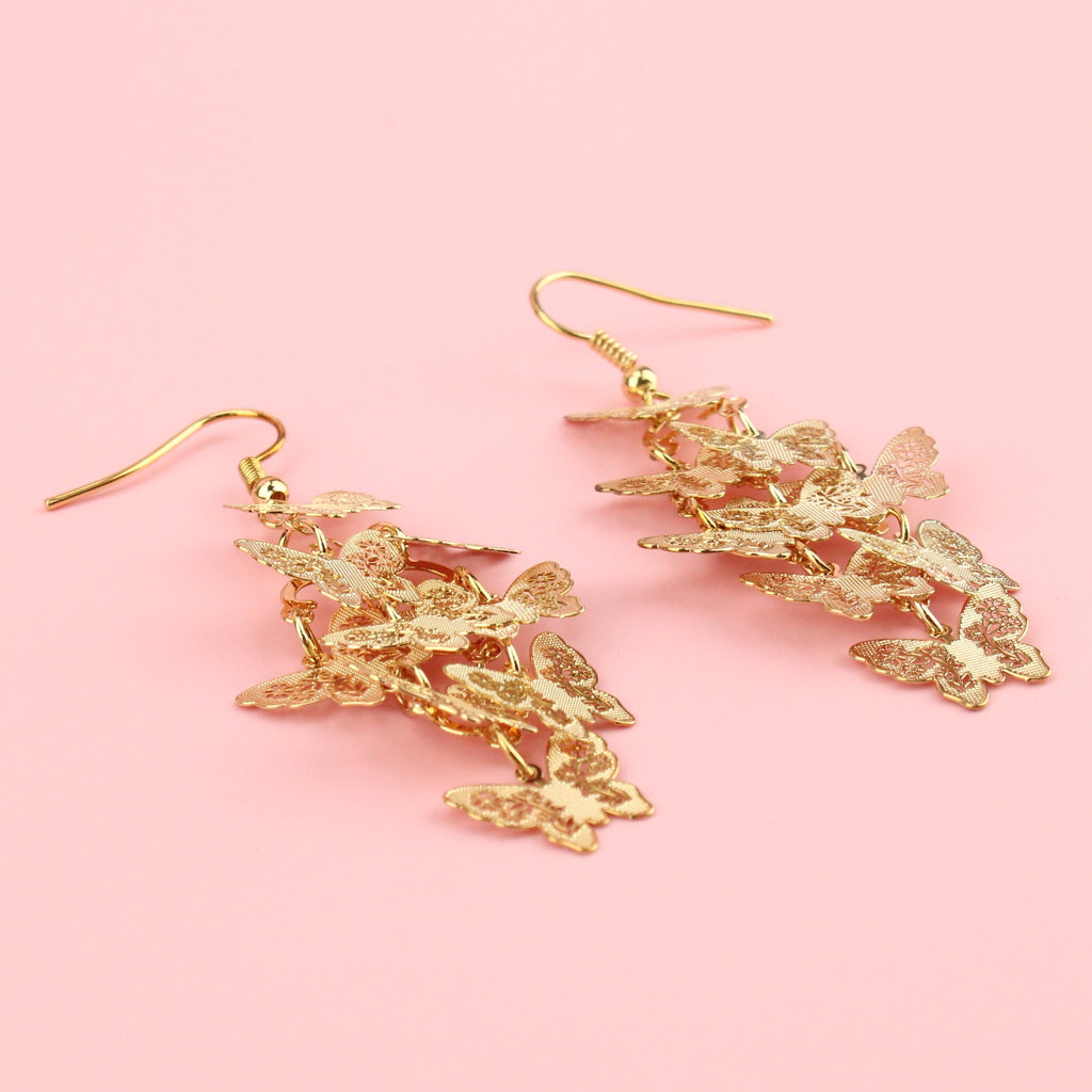 A Cluster of Butterly Charms on Gold Plated wires
