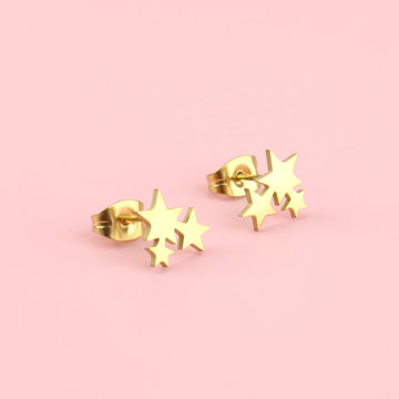 A cluster of three stars on gold plated stainless steel studs