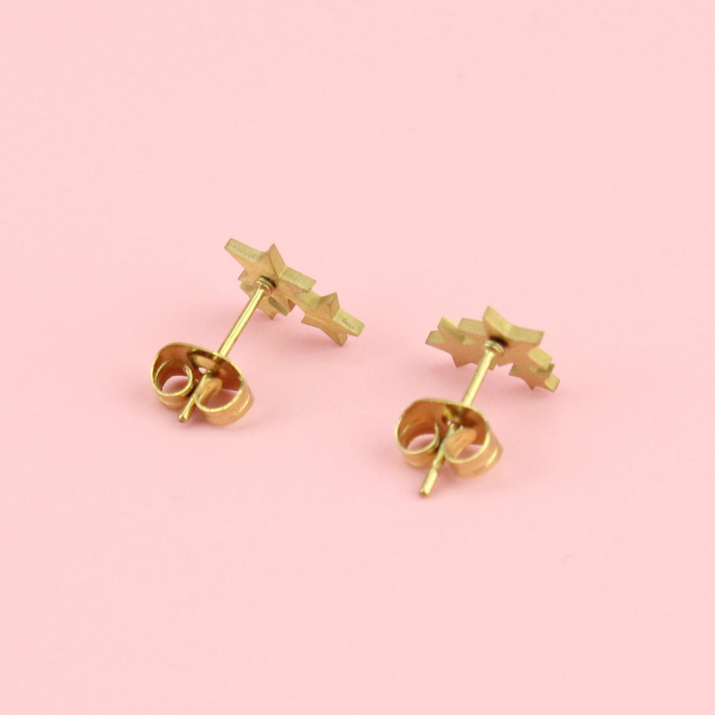 A cluster of three stars on gold plated stainless steel studs
