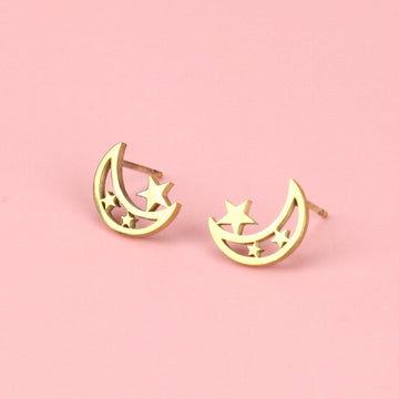 Gold plated stainless steel cut out moon studs with two stars in the moon and one large star on top of the inner cornr of the moon