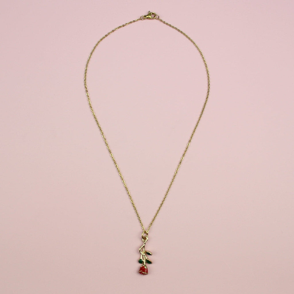 Red Enchanted Rose charm with a green stem on a gold plated stainless steel chain
