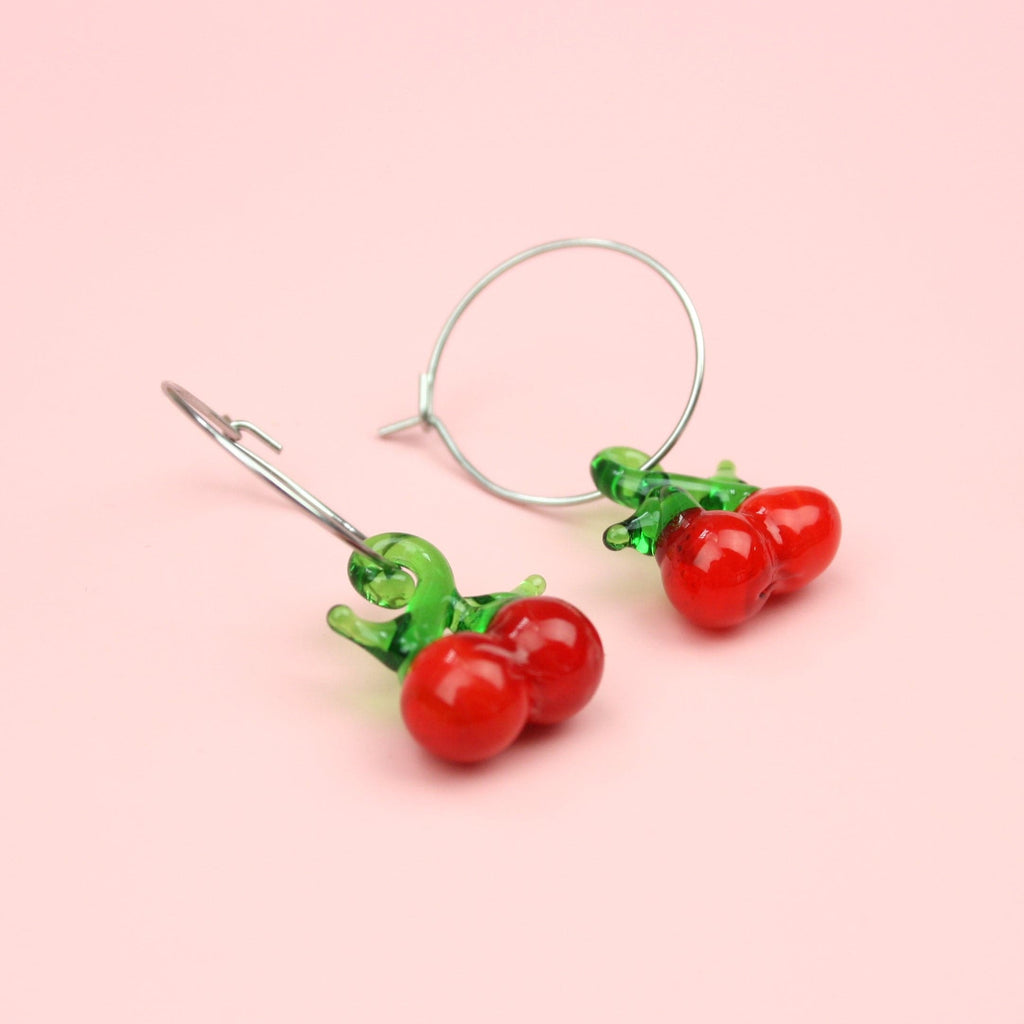 Glass cherry charms on stainless steel hoops
